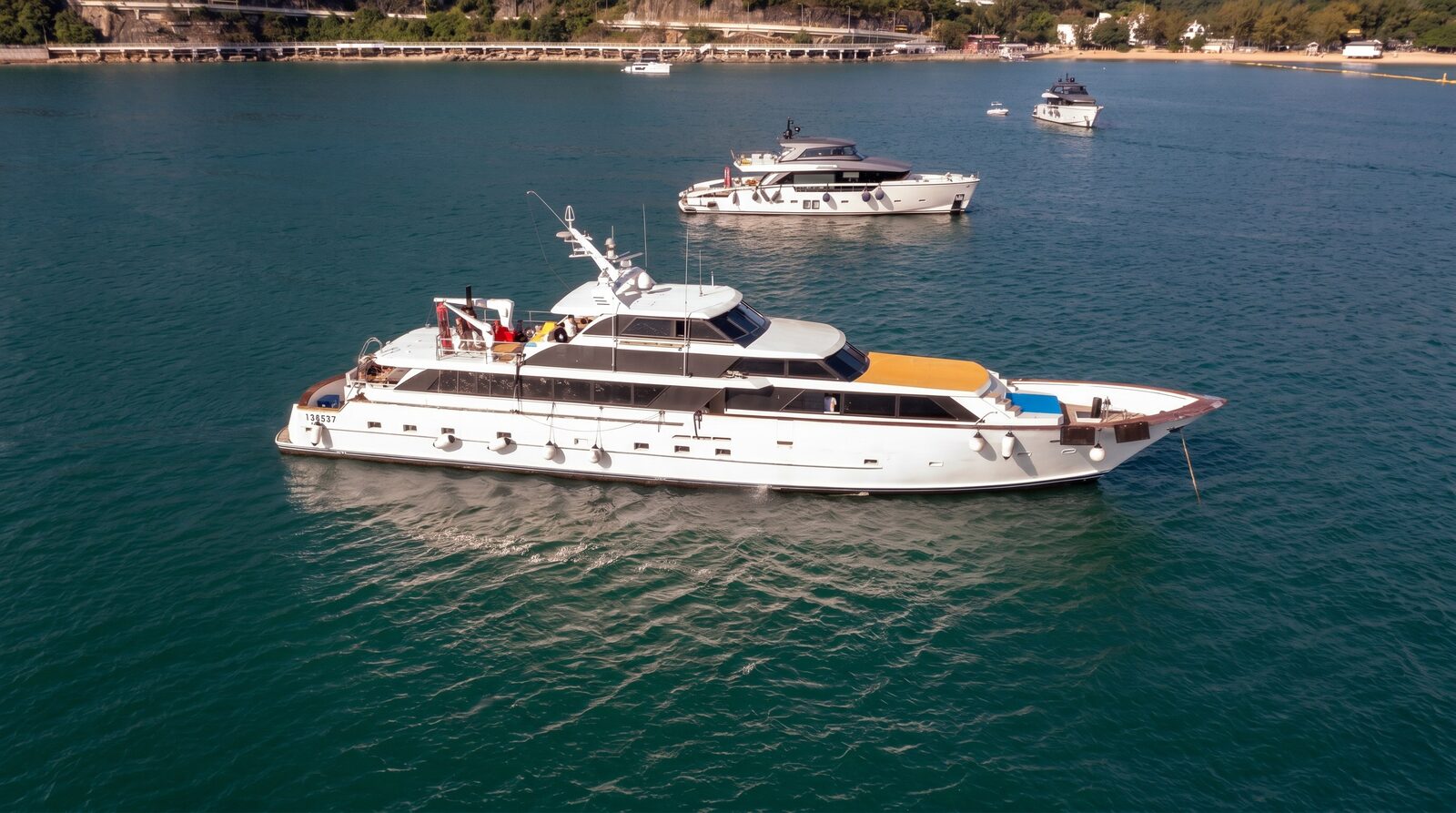 Aerial of Sea Tiger anchored along a Hong Kong beach