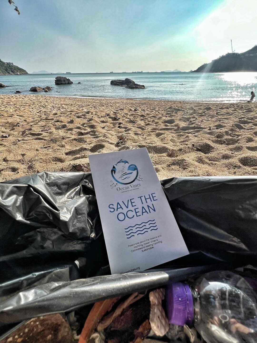 Beach cleanup briefing with OceanVines team